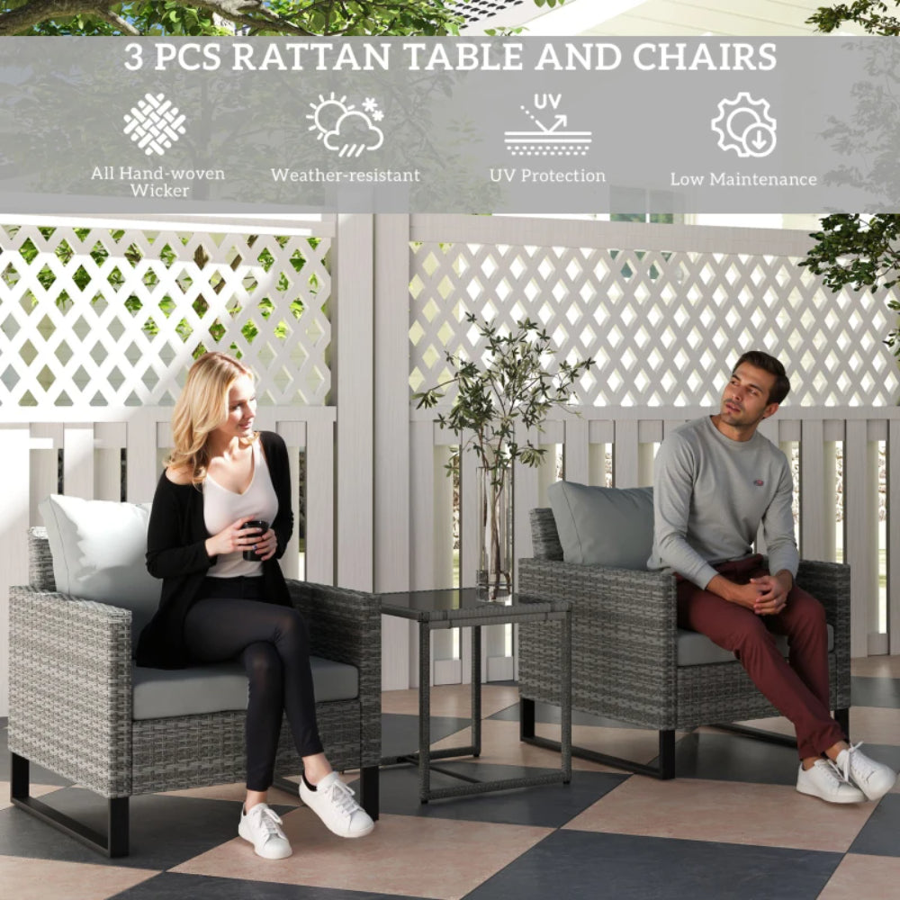 Outsunny 3 Pieces Rattan Bistro Set with 4 Cushions, Wicker Garden Furniture Set, Glass Top Coffee Table and Chairs for Outdoor Patio, Balcony, Terrace and Conservatory