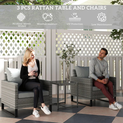 Outsunny 3 Pieces Rattan Bistro Set with 4 Cushions, Wicker Garden Furniture Set, Glass Top Coffee Table and Chairs for Outdoor Patio, Balcony, Terrace and Conservatory